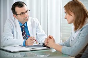 Psychiatrist talking to patient